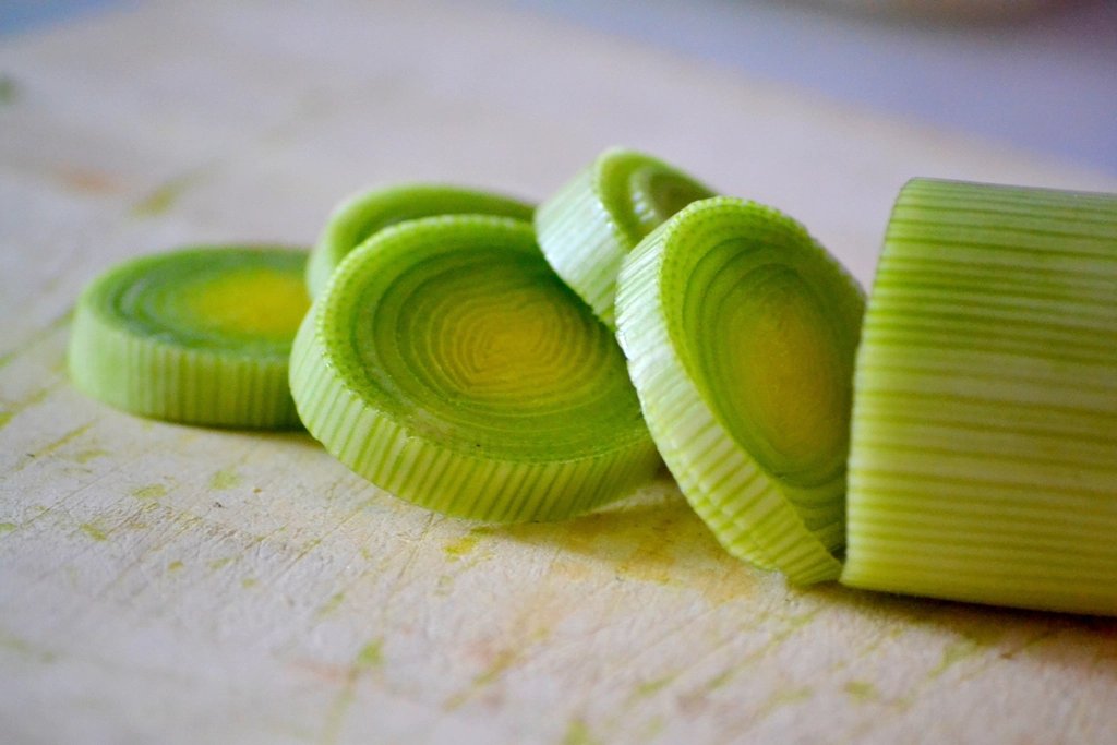 Sliced leeks on a cutting board