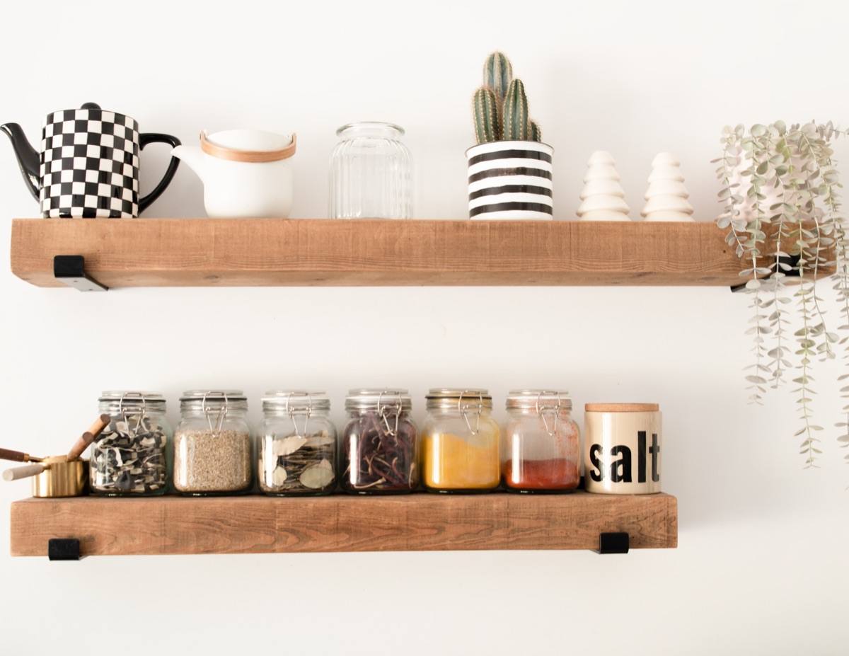 Pantry shelves with jars and cookbooks